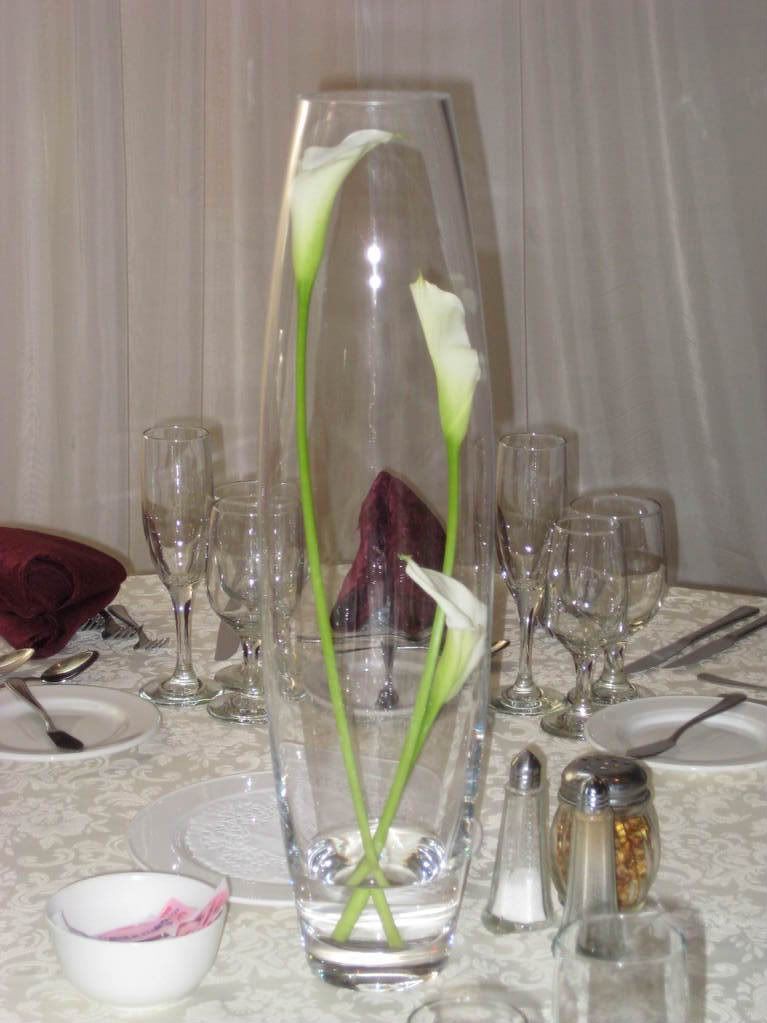 tall glass vases. in tall glass vases for an